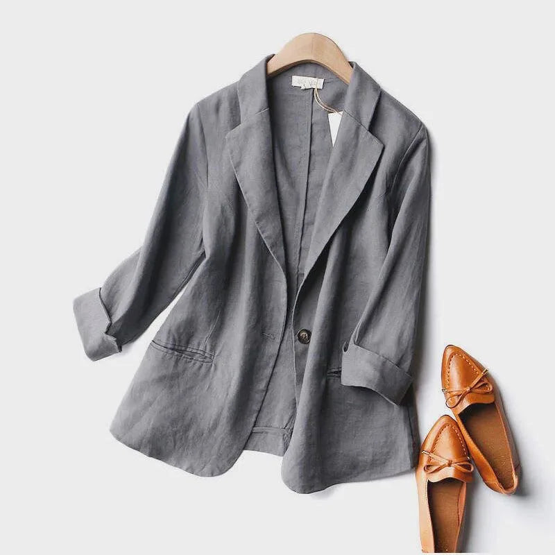 Chic women's relaxed fit lightweight blazer, a versatile layering piece for professional or casual outfits.