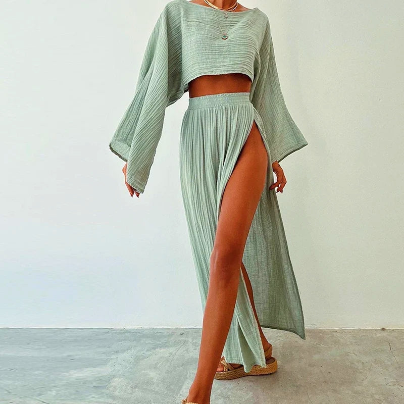 Effortless women's linen blend summer two-piece set featuring a comfy cropped top & stylish slit skirt.