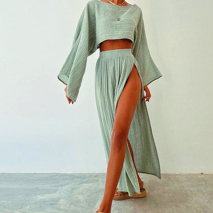 Effortless women's linen blend summer two-piece set featuring a comfy cropped top & stylish slit skirt.