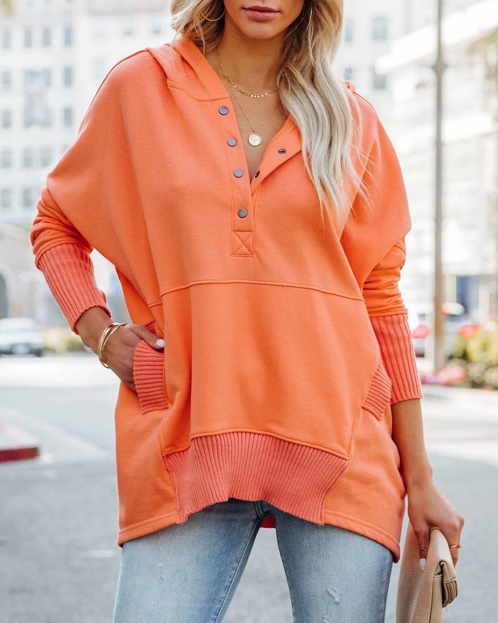 Versatile women's longline tunic hoodie. Relaxed fit pullover sweatshirt for layering & casual outfits.