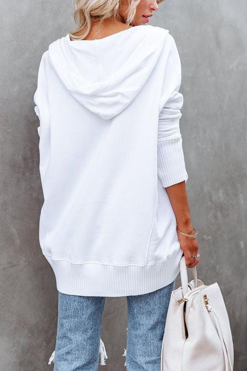 Effortless women's longline tunic hoodie. Relaxed fit pullover sweatshirt, ultimate casual comfort.