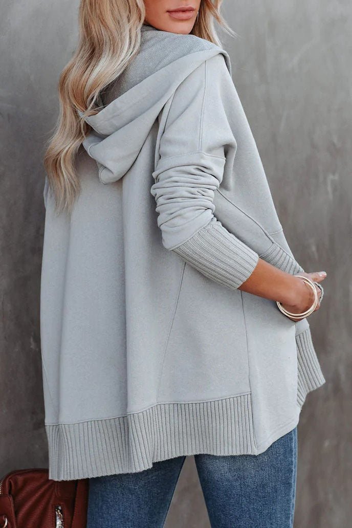Front view of women's relaxed fit longline tunic hoodie. Comfortable pullover sweatshirt with hood.