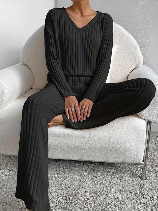 Women's relaxed fit lounge set with soft V-neck top & wide leg pants. Perfect for home wear & comfort.