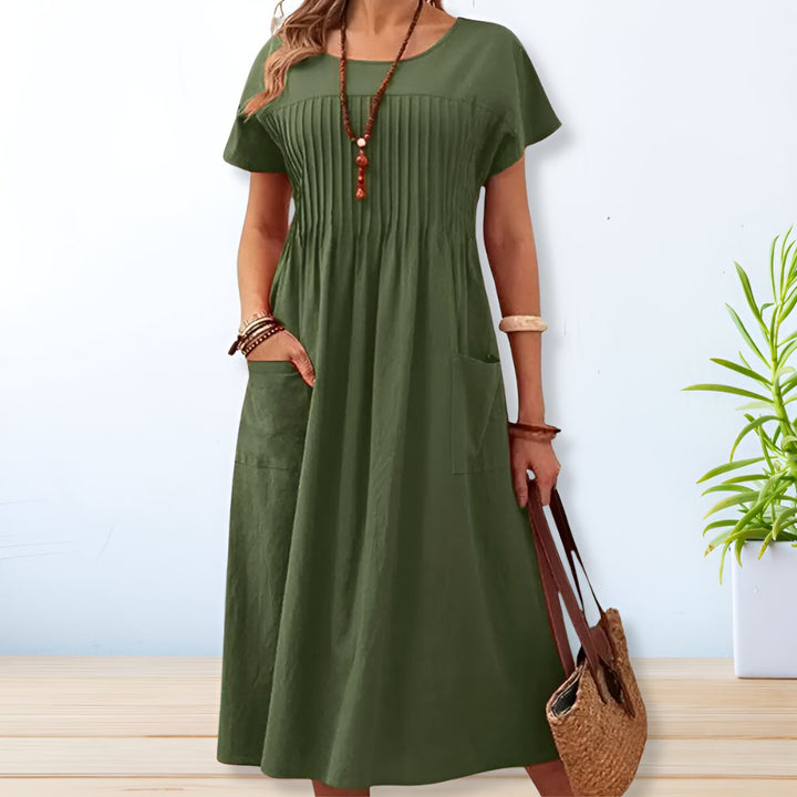 Women's relaxed fit midi day dress with pockets, comfortable short sleeve summer casual wear.