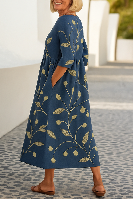 Women's relaxed fit midi dress with 3/4 sleeves, comfortable for effortless everyday wear and versatility.