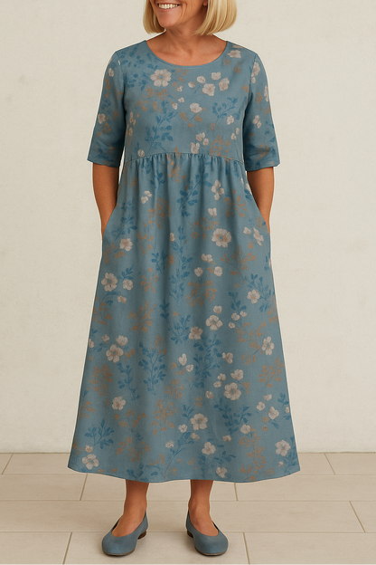 Comfortable women's midi dress with a relaxed fit and 3/4 sleeves, perfect for casual or elegant occasions.