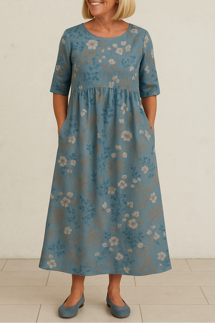 Comfortable women's midi dress with a relaxed fit and 3/4 sleeves, perfect for casual or elegant occasions.