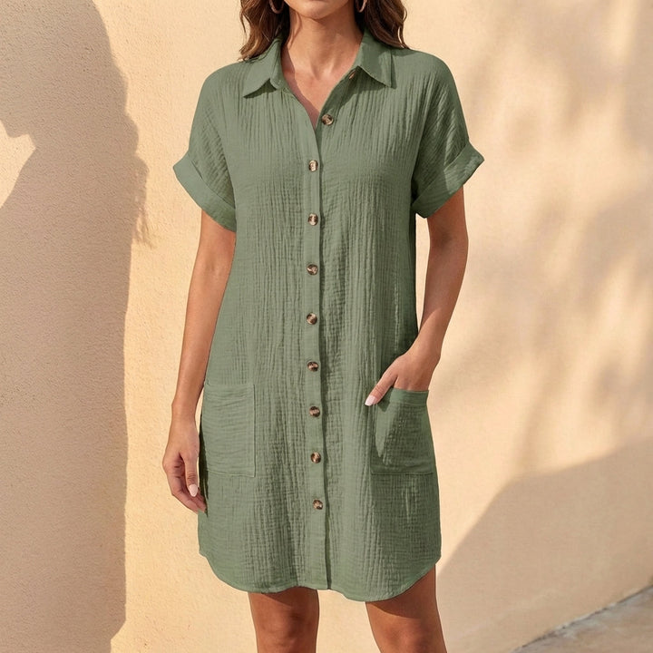 Women's relaxed fit midi shirt dress with button front & cuffed short sleeves. Casual summer style.
