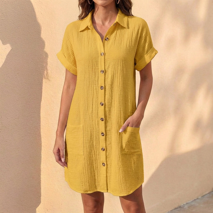 Chic women's relaxed fit midi shirt dress, button-front, cuffed sleeves. Perfect summer or everyday casual dress.