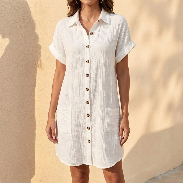 Women's relaxed fit midi shirt dress, button front, cuffed short sleeves. Comfortable casual summer dress.