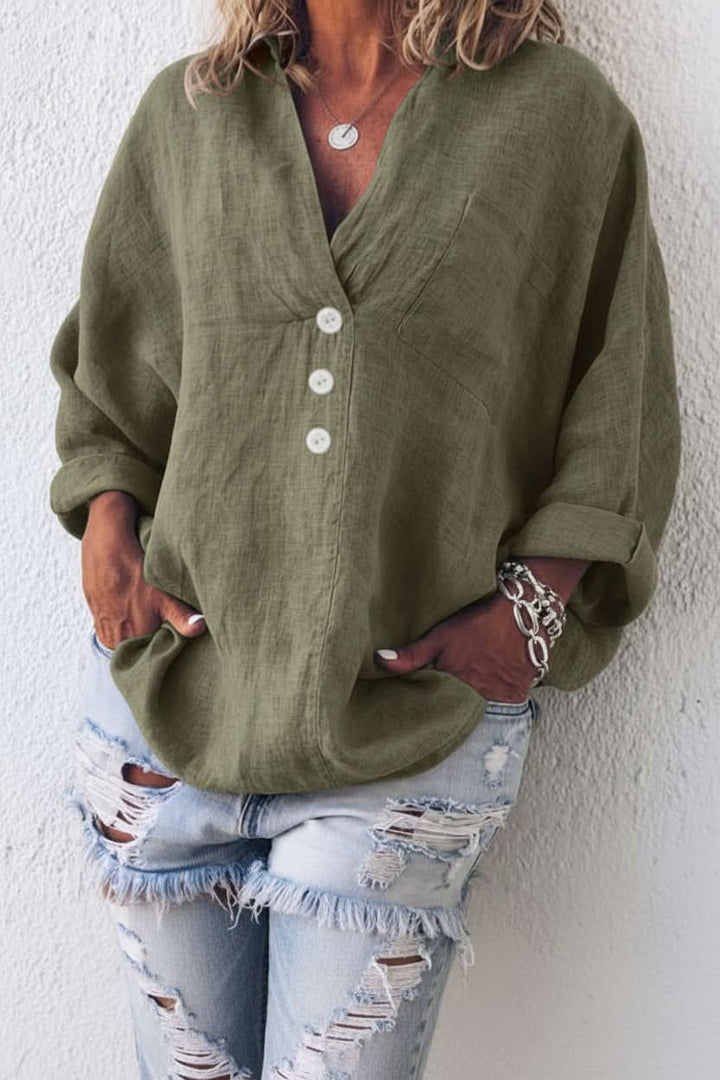 Modern women's long sleeve open back blouse in a relaxed fit, great for chic summer and everyday wear.