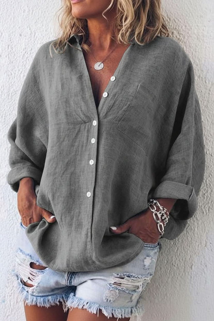 Fashionable women's relaxed top featuring an open back design, perfect for a chic & comfortable look.
