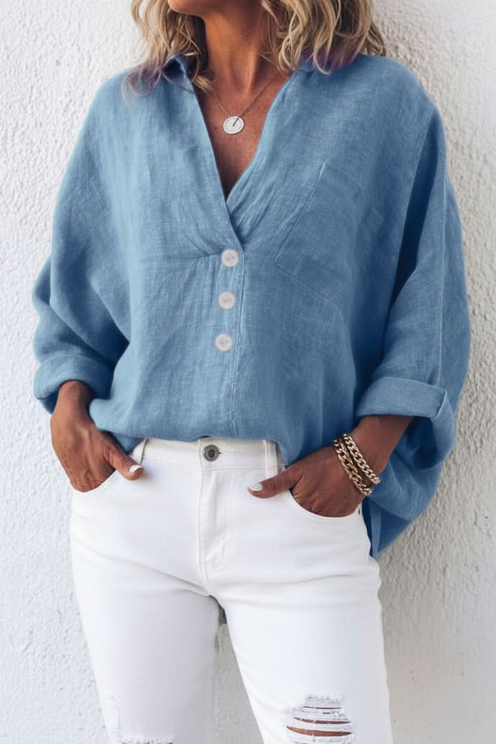Women's relaxed open back long sleeve top. Versatile, comfortable, and chic for summer everyday wear.
