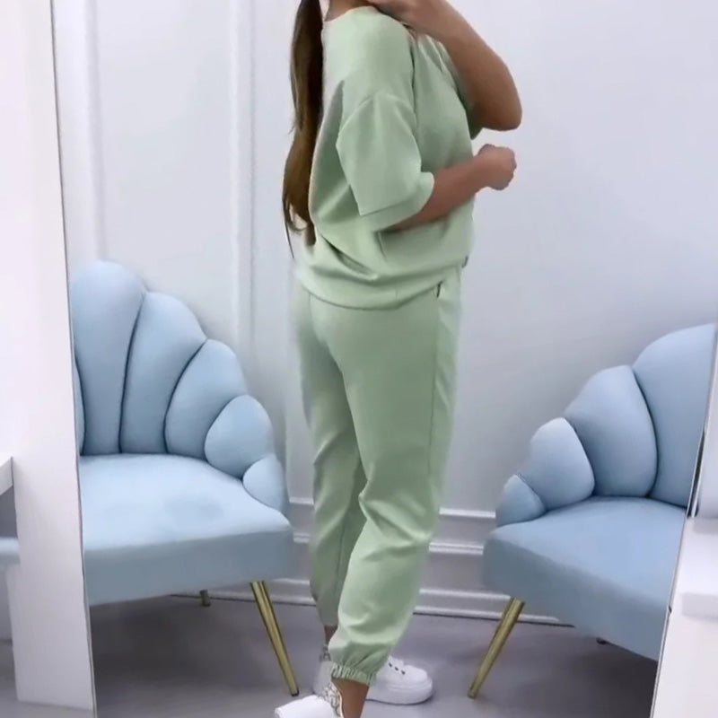 Women's short sleeve relaxed fit lounge set, a comfortable two-piece for versatile casual & everyday wear.