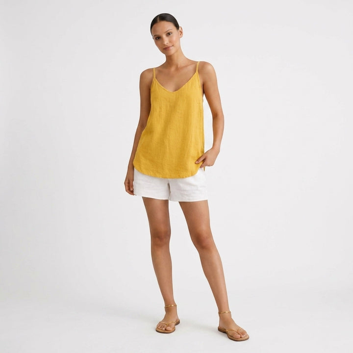 Modern women's relaxed fit spaghetti strap top, great for layering outfits.