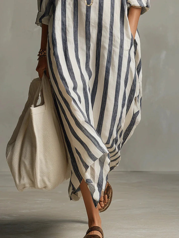 Casual women's striped maxi shirt dress. Relaxed V-neck design, perfect for summer, travel, or everyday wear.