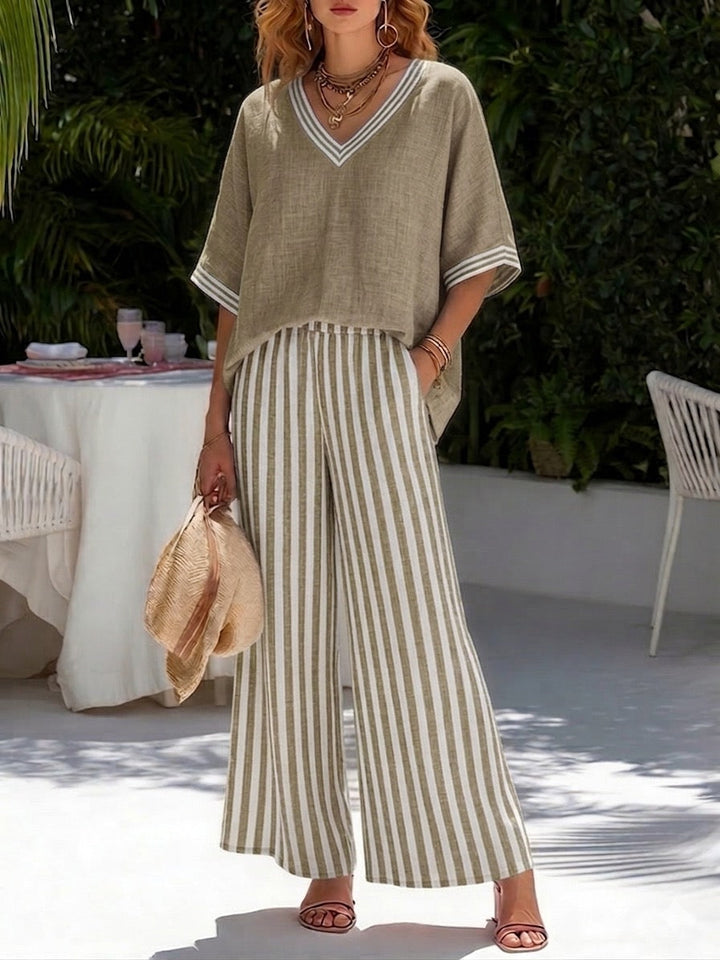 Women's striped relaxed fit shirt and wide leg pant set. Coordinating two-piece casual summer apparel.