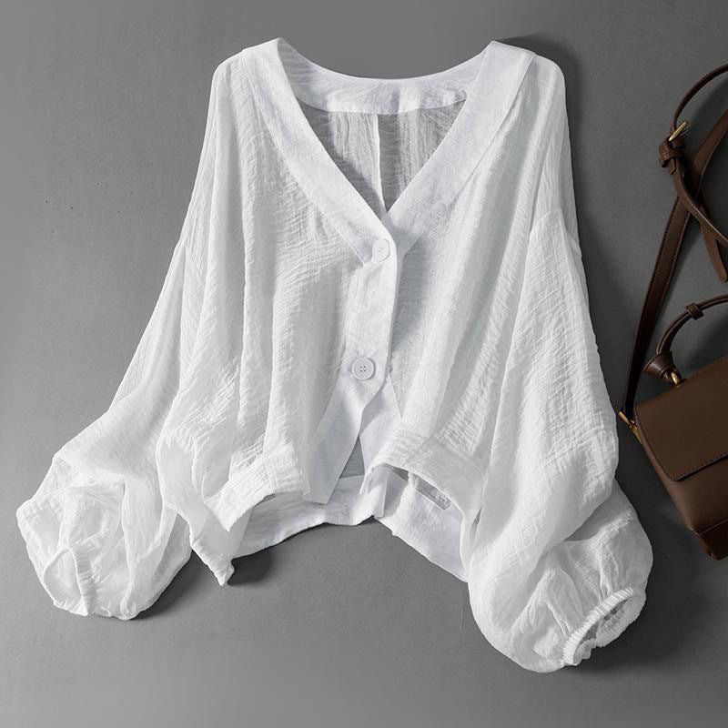 Women's relaxed fit summer blouse, airy and comfortable for everyday casual wear.