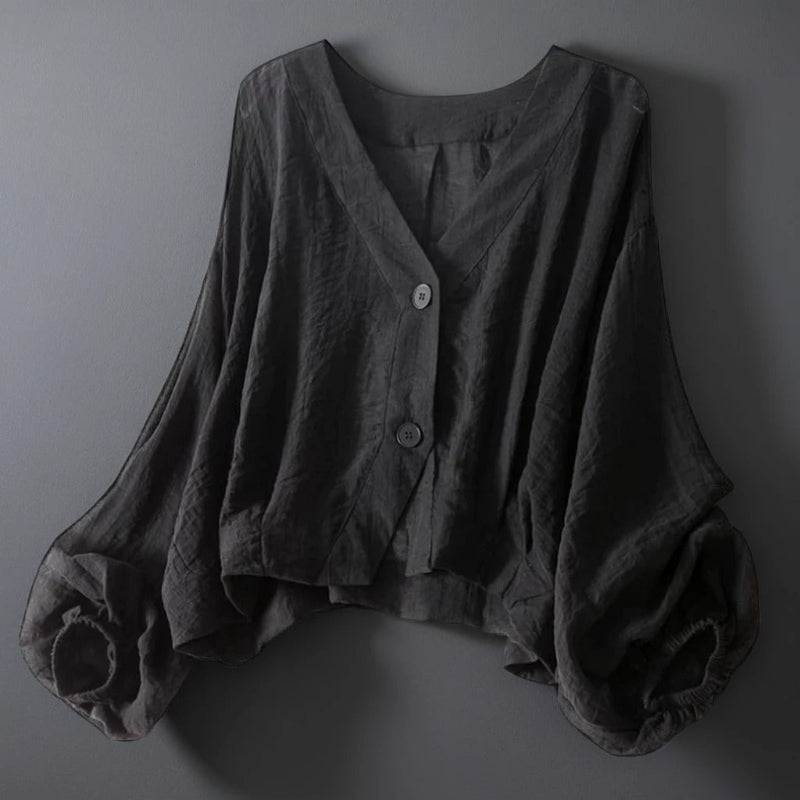 Stylish women's black relaxed fit blouse, perfect for summer casual outings. Airy and comfortable.
