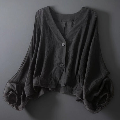 Stylish women's black relaxed fit blouse, perfect for summer casual outings. Airy and comfortable.