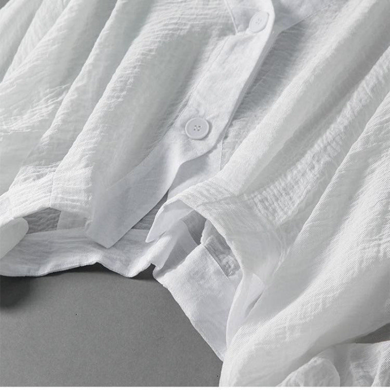 Everyday white relaxed fit button-down blouse for women. Airy summer top, comfortable & stylish.