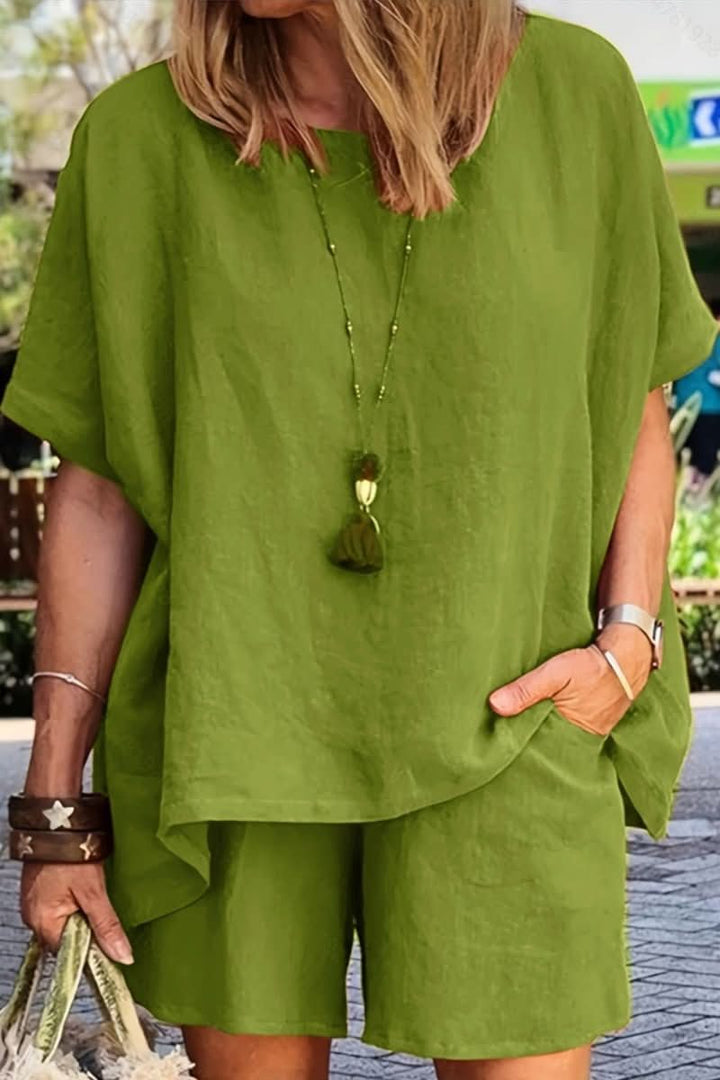 Model wears a comfortable women's relaxed summer co-ord leisure set, perfect for stylish vacation outfits.