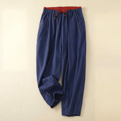 Trendy women's high-waist relaxed fit summer trousers. Wide leg design for comfortable, stylish casual bottoms.