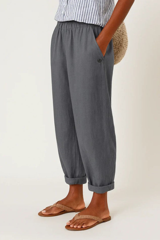 Relaxed fit women's straight-leg trousers with a comfortable elastic waist, great for everyday casual comfort.