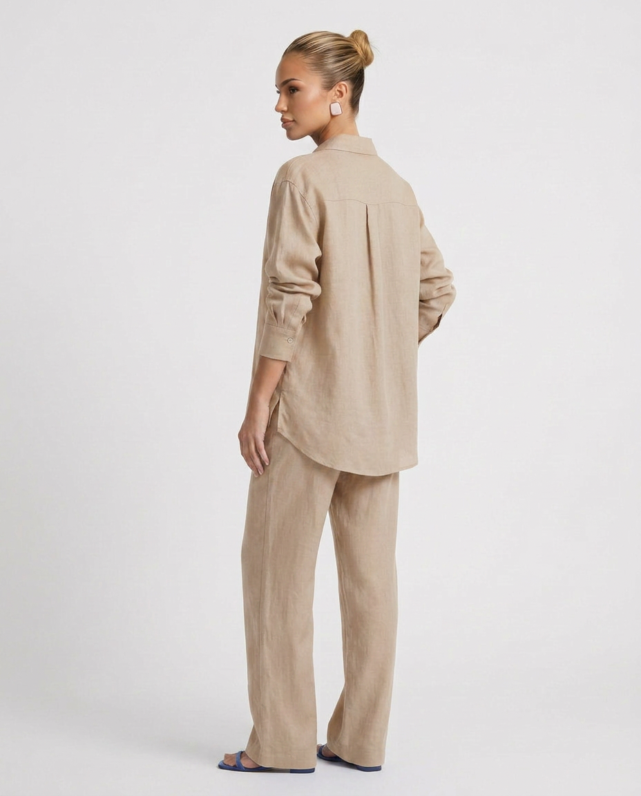Matching women's lounge set with relaxed top & pants, ideal for versatile casual wear.