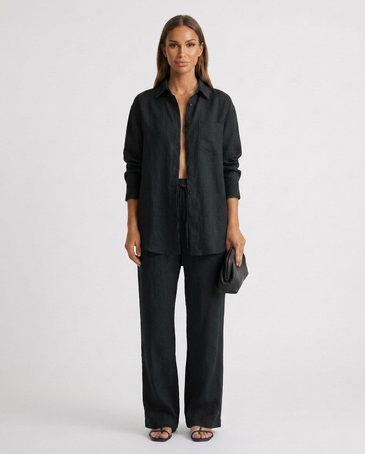 Soft pink women's two-piece lounge set, relaxed fit and cozy for a summer outfit.