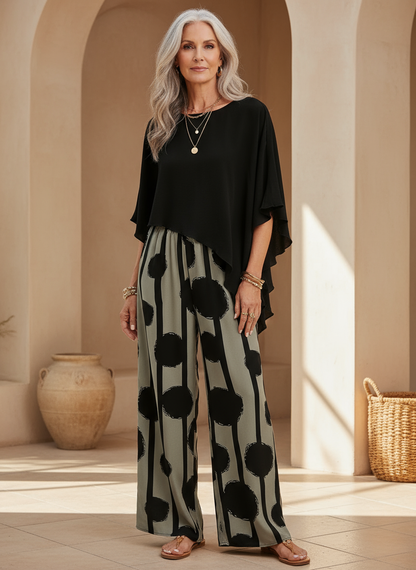 Women's relaxed fit two-piece summer set with abstract print, ideal for casual, comfortable wear.