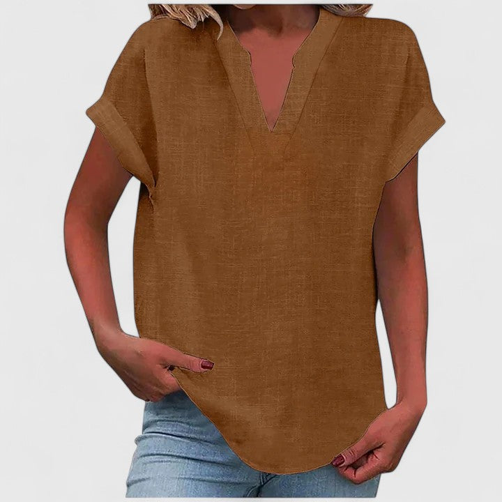 Women's relaxed fit V-neck blouse, comfortable for effortless everyday style and versatile wear.