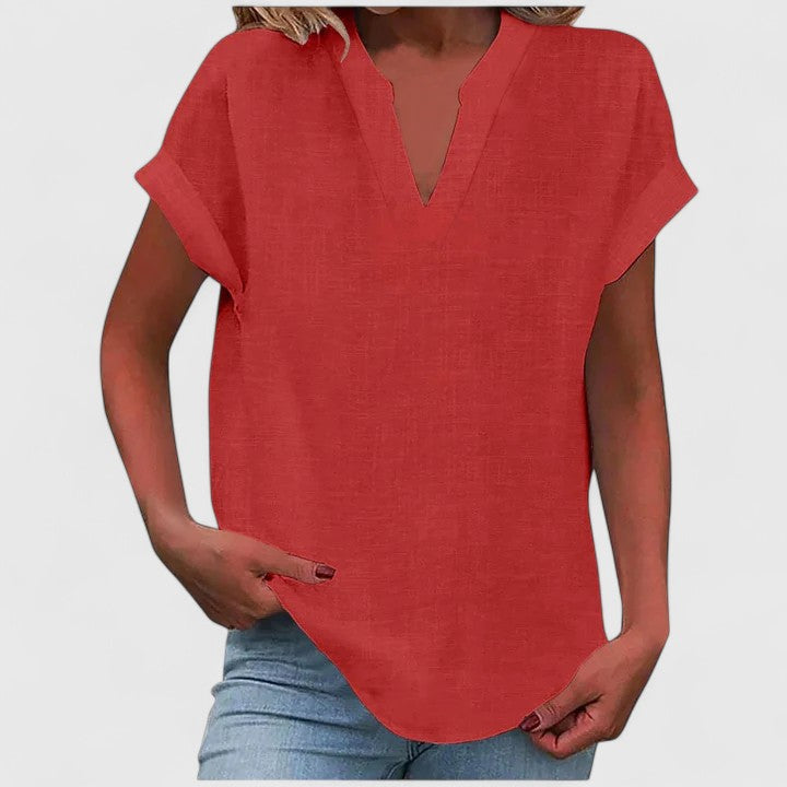 Women's relaxed V-neck blouse, a versatile loose fit top with cap sleeves for any occasion.