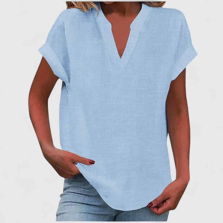 Stylish women's relaxed fit V-neck top, perfect for effortless spring and summer outfits.