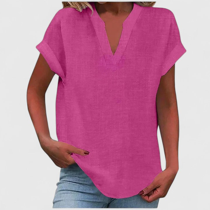 Comfortable women's cap sleeve V-neck top, ideal for casual wear, work, and relaxed everyday style.