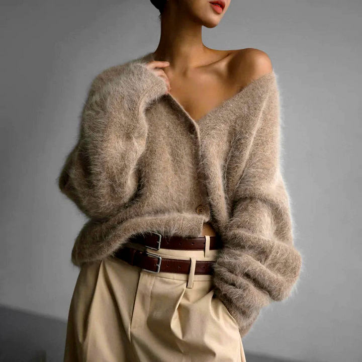 Cozy women's relaxed V-neck button-up cardigan sweater, ideal for comfortable and chic casual wear.