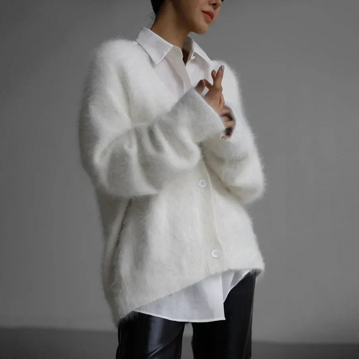 Versatile women's V-neck button cardigan, a relaxed fit layering piece for stylish fall fashion.