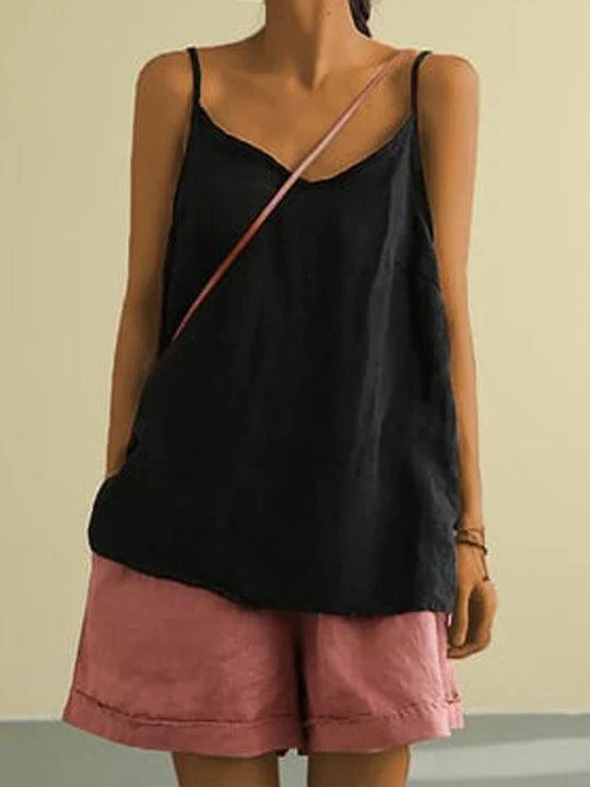 Minimalist women's sleeveless V-neck cami with adjustable straps for a chic, relaxed summer look.