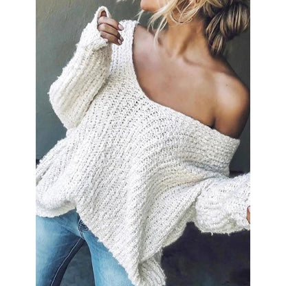 Comfortable women's V-neck knit sweater. Relaxed fit for effortless everyday chic and versatile styling.