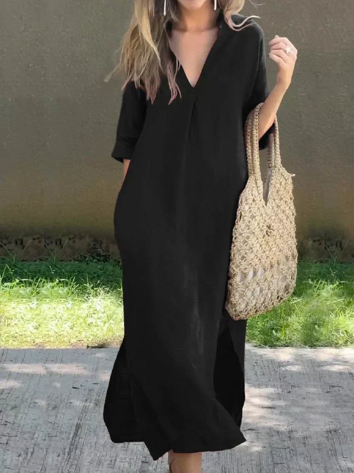 Chic women's relaxed V-neck maxi dress. Flowy design with 3/4 sleeves, great for casual summer outfits.