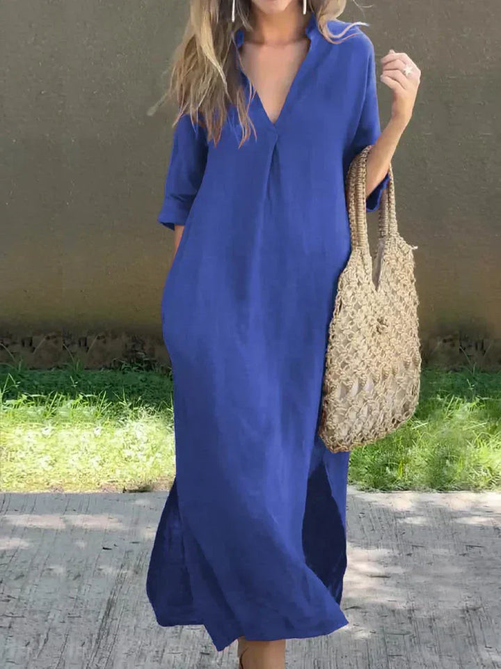 Relaxed V-neck maxi dress for women, with 3/4 sleeves & side slit, offering everyday comfort & flowy style.