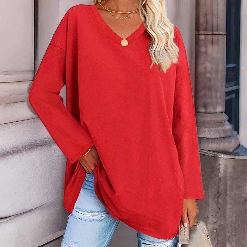 Relaxed fit women's V-neck top. Long sleeve everyday comfort shirt, perfect for stylish casual wear.