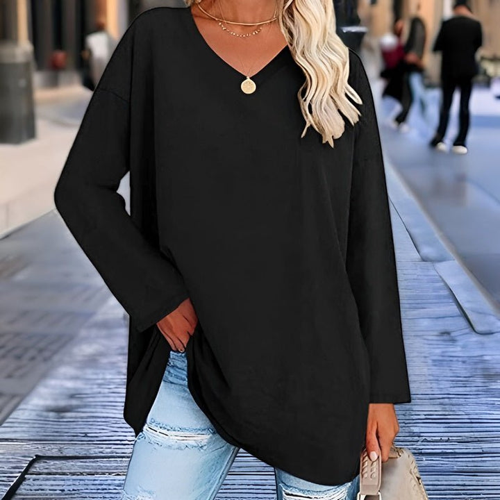 Stylish & comfortable women's V-neck shirt. Relaxed long sleeve top, great for everyday casual wear.