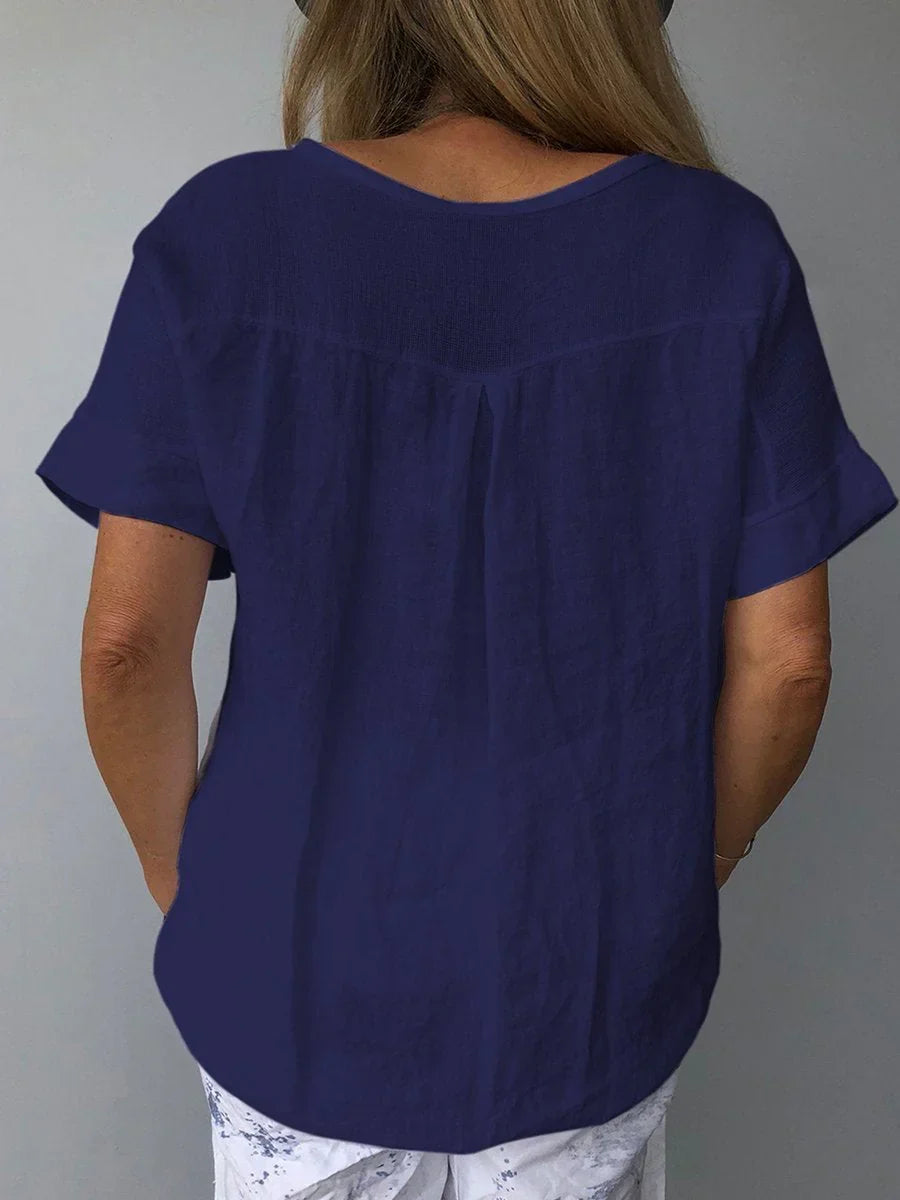 Stylish women's V-neck short sleeve blouse, relaxed fit. Ideal versatile top for everyday wear & travel.