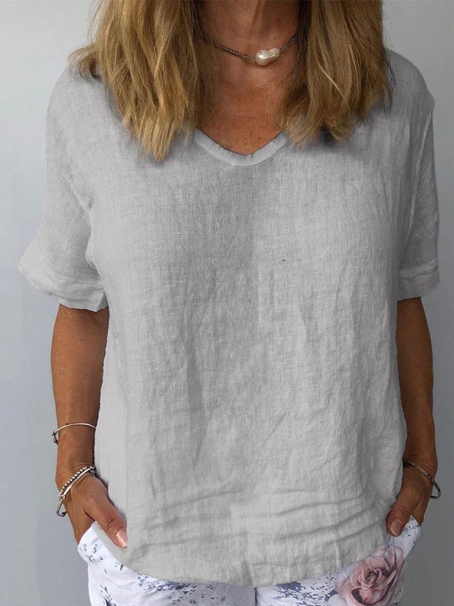 Casual women's relaxed fit V-neck short sleeve blouse. Everyday comfort top, perfect for summer.