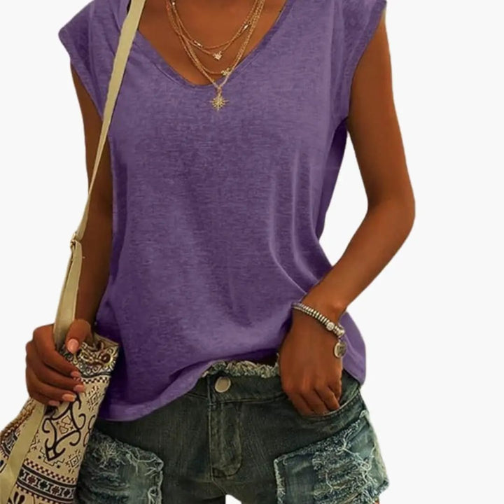 Women's V-neck sleeveless top, perfect vacation wear for warm weather, combines comfort and style.