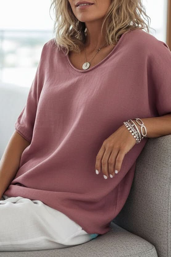 Ocean blue women's relaxed fit V-neck blouse. Stylish summer top for warm weather & casual everyday wear.