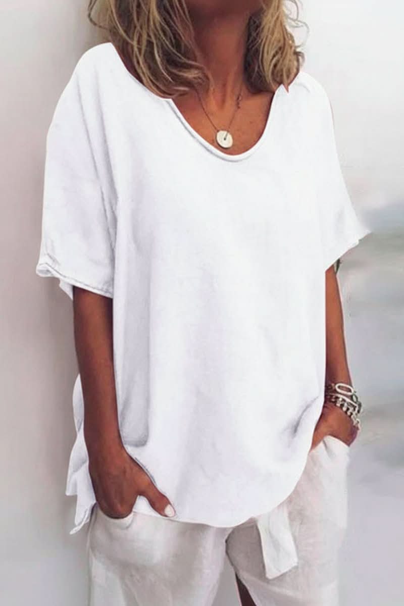 Women's versatile relaxed V-neck summer blouse for effortless casual style and warm weather fashion.
