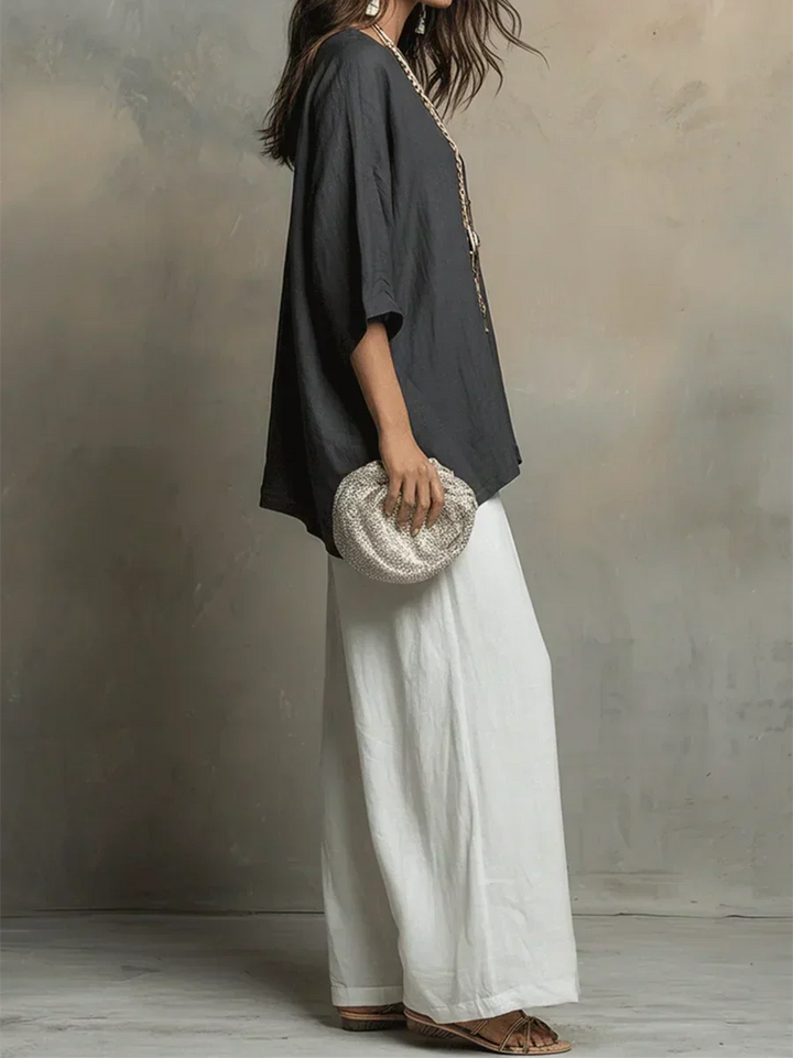 Women's relaxed fit shirt and wide-leg pants two-piece set for stylish, comfortable summer & vacation outfits.