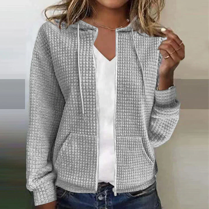 Stylish women's long-sleeve zip-up jacket with a relaxed fit. A comfortable & versatile outerwear piece for women.